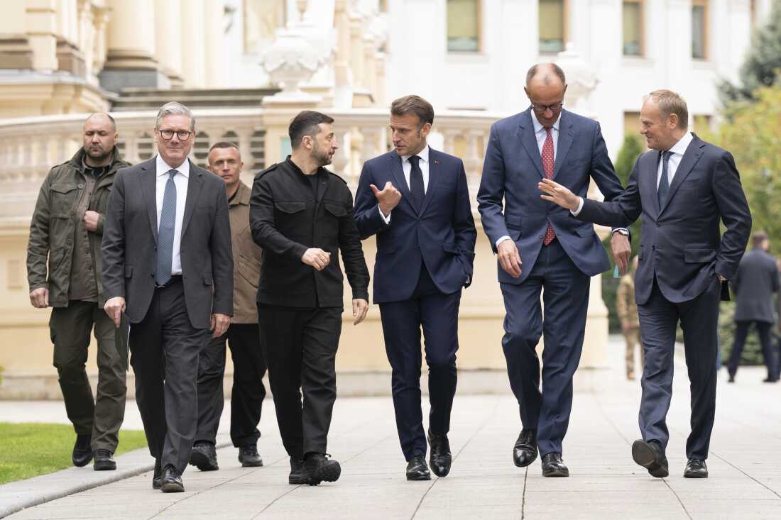 From second left, British Prime Minister Keir Starmer, Ukrainian President Volodymyr Zelenskyy, French President Emmanuel Macron, German Chancellor Friedrich Merz and Poland's Prime Minister Donald Tusk walk at the Presidential Palace in Kyiv, Ukraine, Saturday May 10, 2025. (Stefan Rousseau/Pool Photo via AP)