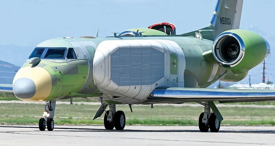 An EC-37B Compass Call arrives at Davis-Monthan Air Force Base, Arizona, Aug. 17, 2022. Compass Call suppresses air defenses by preventing the transmission of essential information between adversaries, their weapon systems, and control networks. (U.S. Air Force photo by Airman 1st Class Vaughn Weber)
