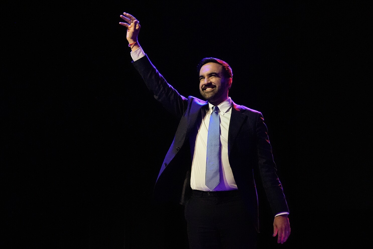 Zohran Mamdani reacts as he walks on stage to speak at a mayoral election night watch party, Tuesday, Nov. 4, 2025, in New York. (AP Photo/Yuki Iwamura)