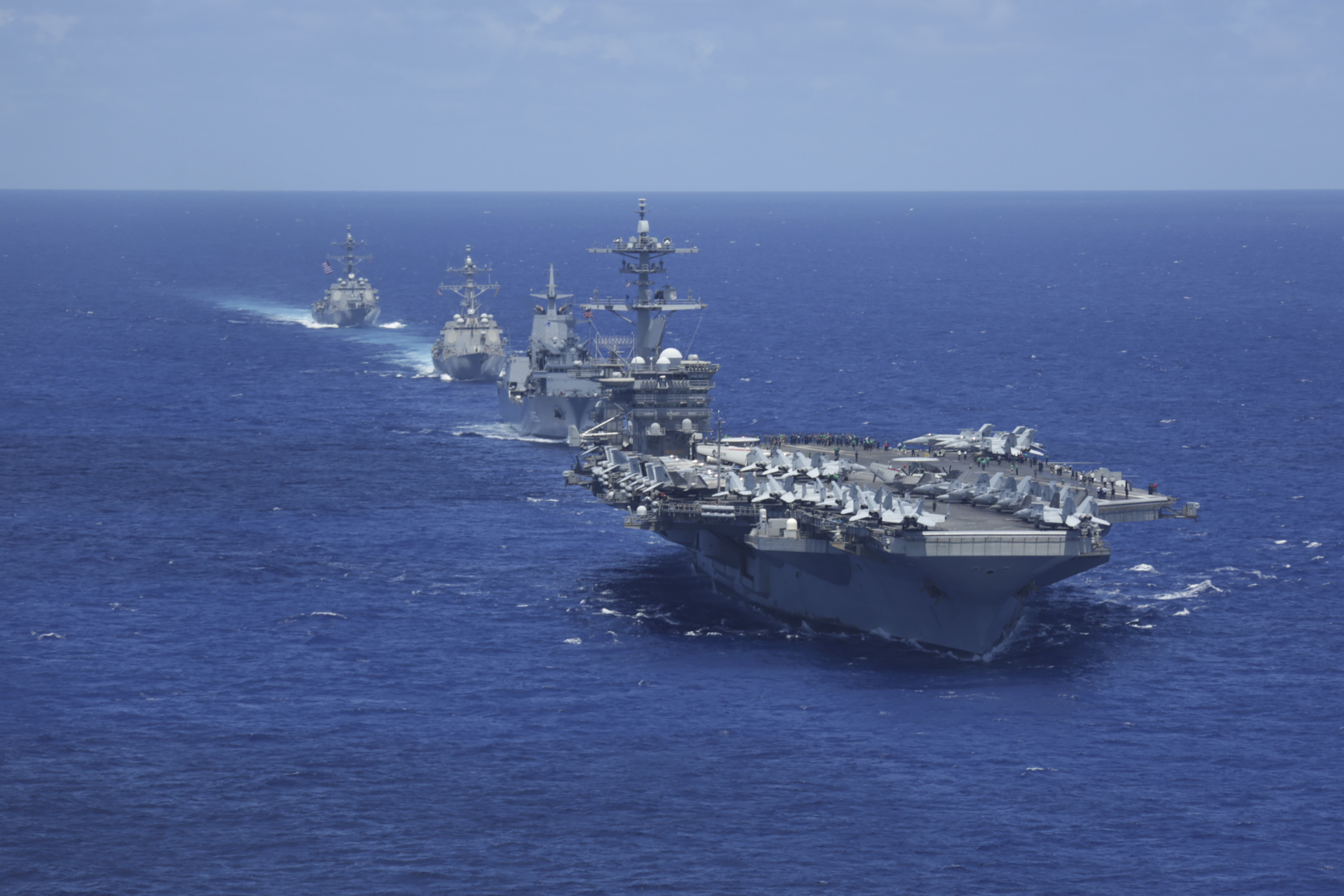 220623-N-DF558-1791 PACIFIC OCEAN (June 23, 2022) Nimitz-class aircraft carrier USS Abraham Lincoln  (CVN 72), Royal Australian Navy auxiliary oiler replenishment ship HMAS Supply (AO 195), Arleigh Burke-class guided-missile destroyer USS Gridley  (DDG 101) and Arleigh Burke-class guided-missile destroyer USS Spruance (DDG 111) sail in formation with Abraham Lincoln Carrier Strike Group (ABECSG), Japan Maritime Self-Defense Force and RAN ships. ABECSG is underway conducting routine operations in the U.S. 3rd Fleet. An integral part of U.S. Pacific Fleet, U.S. 3rd Fleet leads naval forces in the Indo-Pacific and provides the realistic, relevant training necessary to flawlessly execute our Navy’s role across the full spectrum of military operations—from combat operations to humanitarian assistance and disaster relief. U.S. 3rd Fleet works together with our allies and partners to advance freedom of navigation, the rule of law, and other principles that underpin security for the Indo-Pacific region.(U.S. Navy photo by Mass Communication Specialist Seaman Aleksandr Freutel)