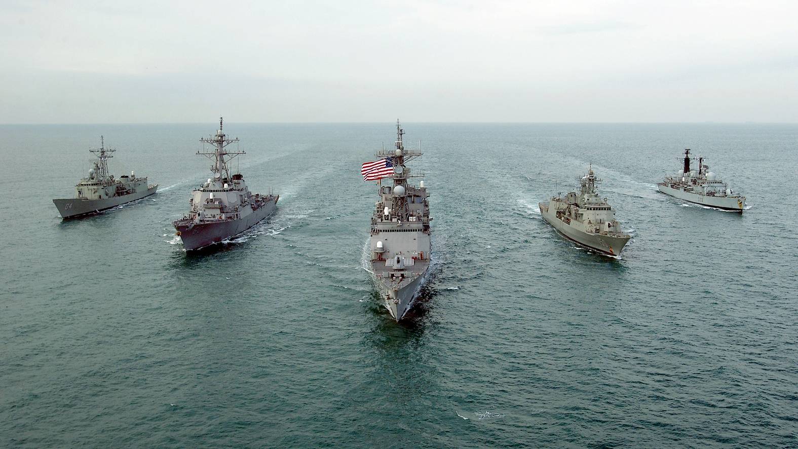 021216-N-5319A-003 - Central Command AOR - Her Majesty's Australian Ship  HMAS DARWIN (F 04), USS PAUL HAMILTON (DDG 60), USS FLETCHER (DD 992), HMAS ANZAC (F 150), and Her Majesty's Ship HMS CARDIFF (D 108) conducting (MIO) Maritime Interdiction Operations in the Arabian Gulf take time to cruise in formation for a photography exercise.  The fore mentioned ships are in the Central Command AOR in support of Operation Enduring Freedom and in accordance with Security Council resolutions.  Official U.S. Navy Photograph by: Photographers Mate First Class PH1 Brien Aho; Fleet Combat Camera, AtlanticFor Official Use Only  (FOUO) NOT CLEARED FOR PUBLIC RELEASE by CDR. Jeff Alderson, COMUSNAVCENT/ 5TH Fleet PAO.