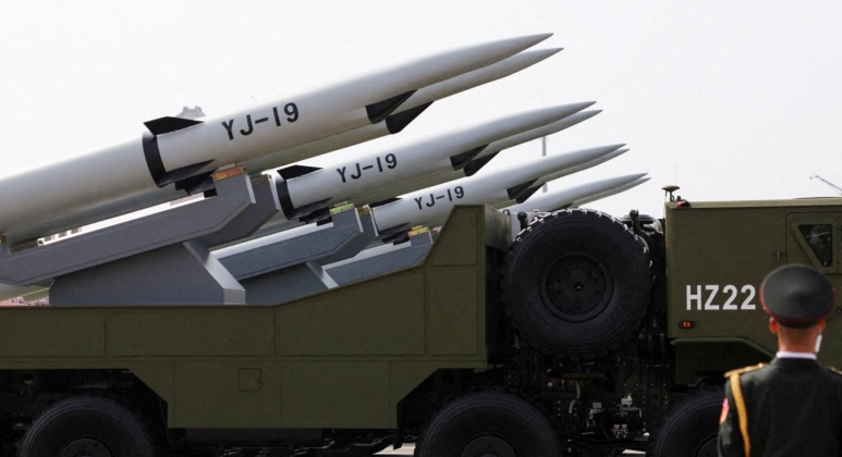 A member of the People's Liberation Army stands as the maritime operations group displays YJ-19 hypersonic anti-ship missiles during a military parade to mark the 80th anniversary of the end of World War Two, in Beijing, China, September 3, 2025. REUTERS/Tingshu Wang     TPX IMAGES OF THE DAY     