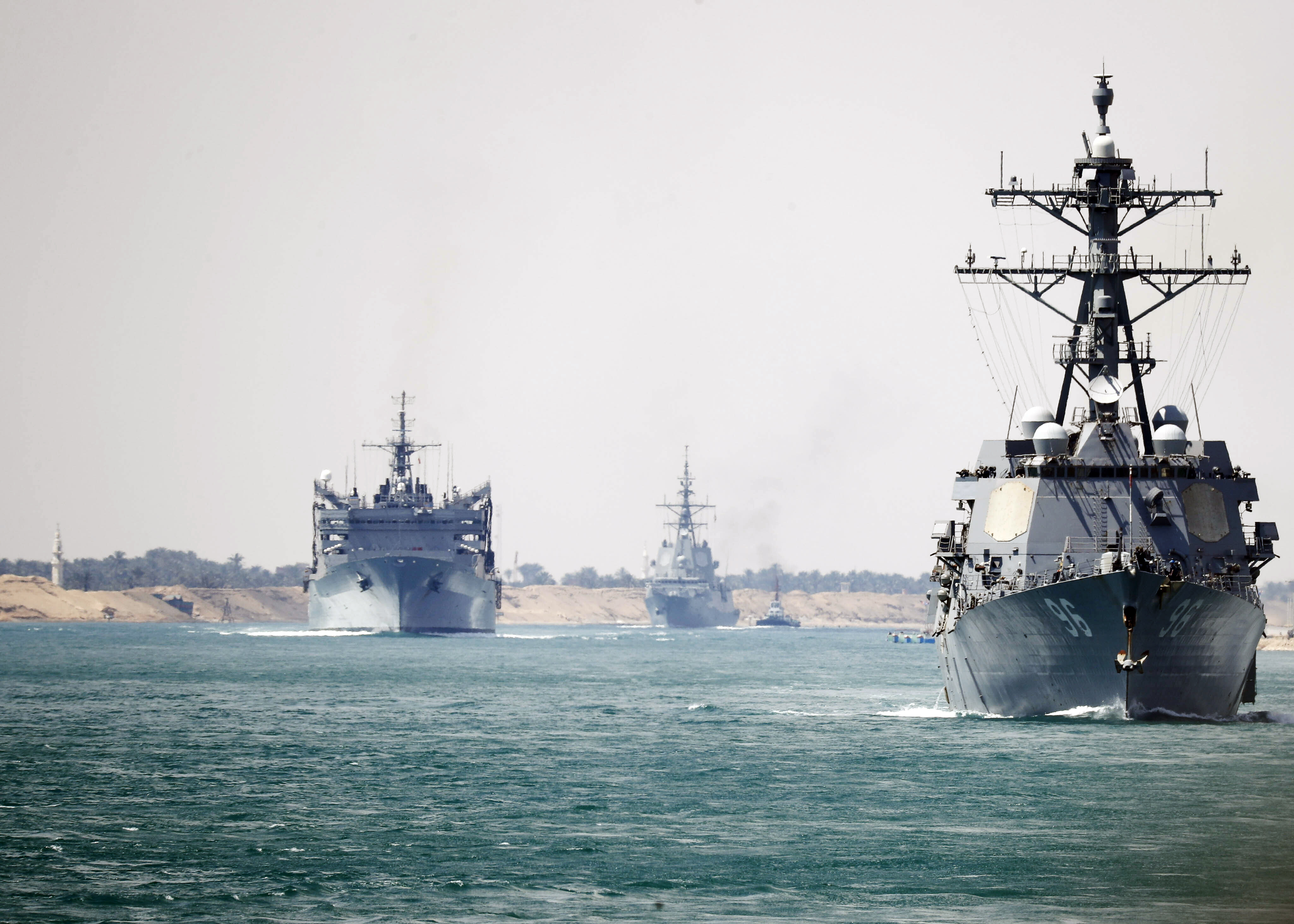 190509-N-GH108-0211SUEZ CANAL (May 9, 2019) The Abraham Lincoln Carrier Strike Group  transits the Suez Canal. The Abraham Lincoln Carrier Strike Group (ABECSG) is deployed to the U.S. Central Command area of responsibility in order to defend American forces and interests in the region. With Abraham Lincoln as the flagship, deployed strike group assets include staffs, ships and aircraft of Carrier Strike Group 12 (CSG 12), Destroyer Squadron 2 (DESRON 2), USS Leyte Gulf (CG 55) and Carrier Air Wing 7 (CVW 7); as well as the Spanish navy Àlvaro de Bazàn-class frigate ESPS Méndez Núñez (F 104). (U.S. Navy photo by Mass Communication Specialist 3rd Class Darion Chanelle Triplett/Released)