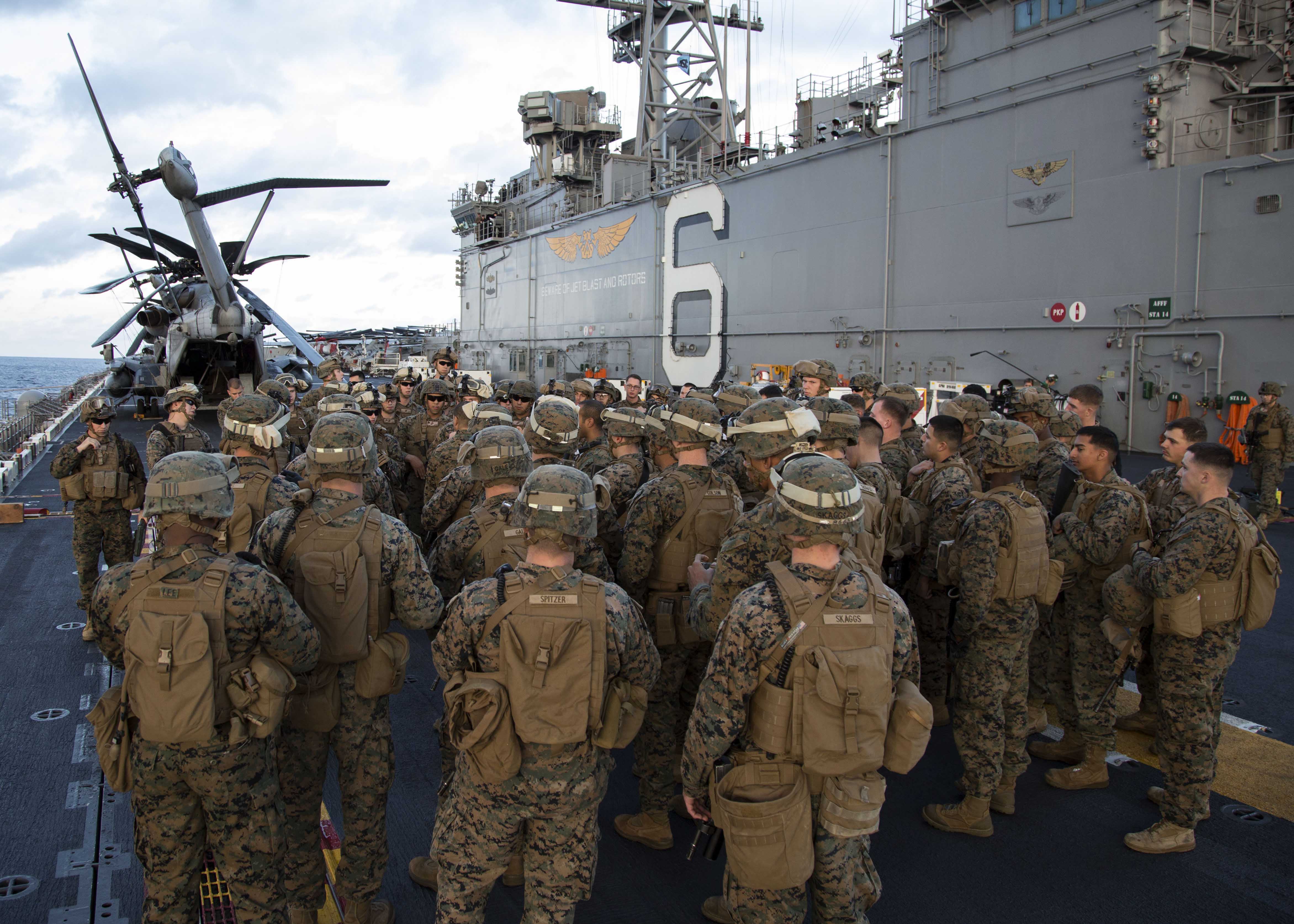 150210-N-GG858-001 EAST CHINA SEA (Feb. 10, 2015) Marines assigned to the 31st Marine Expeditionary Unit (31st MEU) prepare for a live-fire exercise on the flight deck of the amphibious assault ship USS Bonhomme Richard (LHD 6). Bonhomme Richard is underway conducting operations in the U.S. 7th Fleet area of responsibility. (U.S. Navy photo by Mass Communication Specialist 2nd Class Matthew Dickinson/Released)           