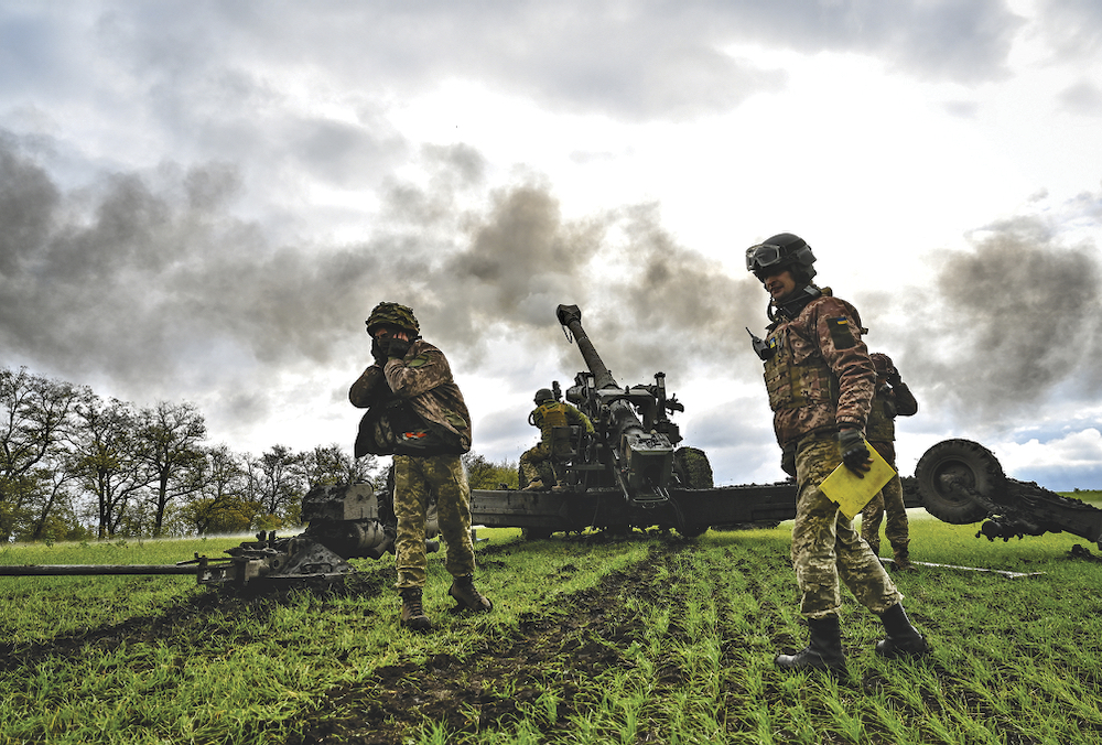 ZAPORIZHZHIA REGION, UKRAINE - OCTOBER 27, 2022 - Artillerymen of Ukraine's Armed Forces destroy the Russian invaders with the help of the German 155-mm FH70 howitzer, Zaporizhzhia Region, southeastern Ukraine. NO USE RUSSIA. NO USE BELARUS.NO USE FRANCE