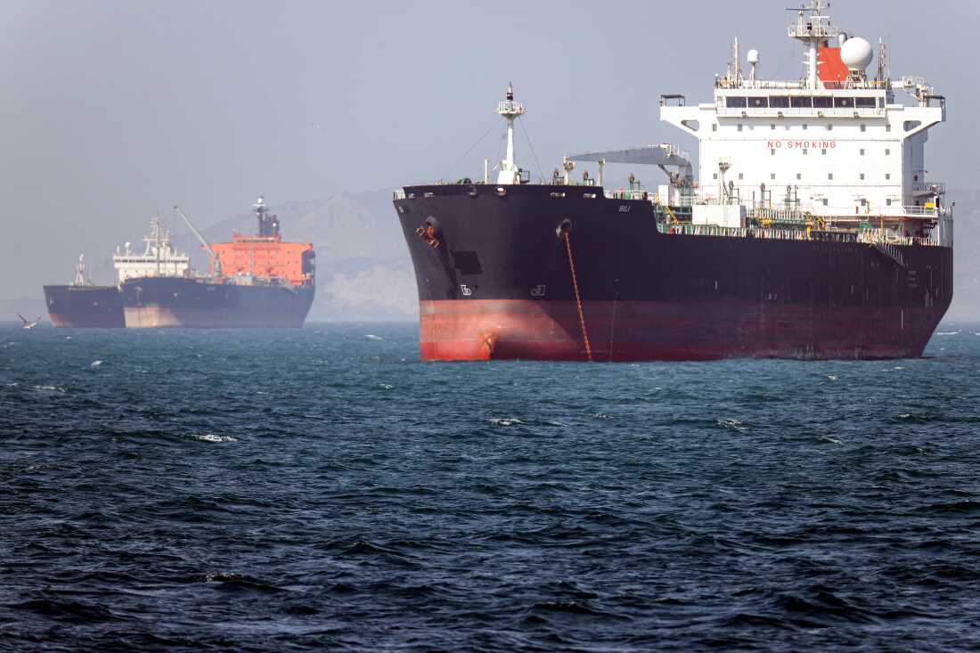 In this picture obtained from Iran's ISNA news agency and taken on May 2, 2026, the Gambia-flagged tanker vessel Bili is pictured anchored in the Strait of Hormuz off Bandar Abbas in southern Iran. Iran's Revolutionary Guards on May 4 denied that any commercial ships had crossed the Strait of Hormuz, after the US military earlier said two US-flagged merchant vessels had transited through the vital waterway. (Photo by Amirhossein KHORGOOEI / ISNA / AFP) / 