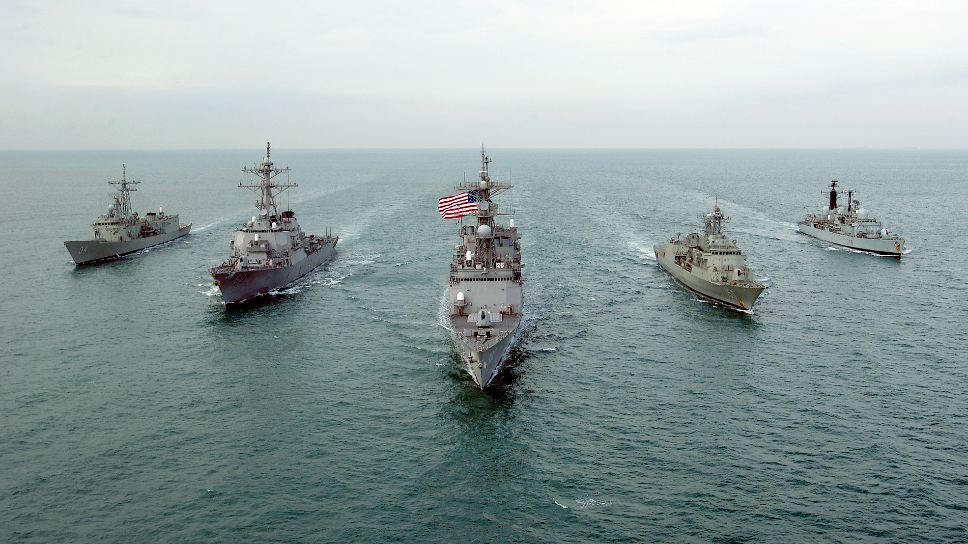 021216-N-5319A-003 - Central Command AOR - Her Majesty's Australian Ship  HMAS DARWIN (F 04), USS PAUL HAMILTON (DDG 60), USS FLETCHER (DD 992), HMAS ANZAC (F 150), and Her Majesty's Ship HMS CARDIFF (D 108) conducting (MIO) Maritime Interdiction Operations in the Arabian Gulf take time to cruise in formation for a photography exercise.  The fore mentioned ships are in the Central Command AOR in support of Operation Enduring Freedom and in accordance with Security Council resolutions.  Official U.S. Navy Photograph by: Photographers Mate First Class PH1 Brien Aho; Fleet Combat Camera, AtlanticFor Official Use Only  (FOUO) NOT CLEARED FOR PUBLIC RELEASE by CDR. Jeff Alderson, COMUSNAVCENT/ 5TH Fleet PAO.
