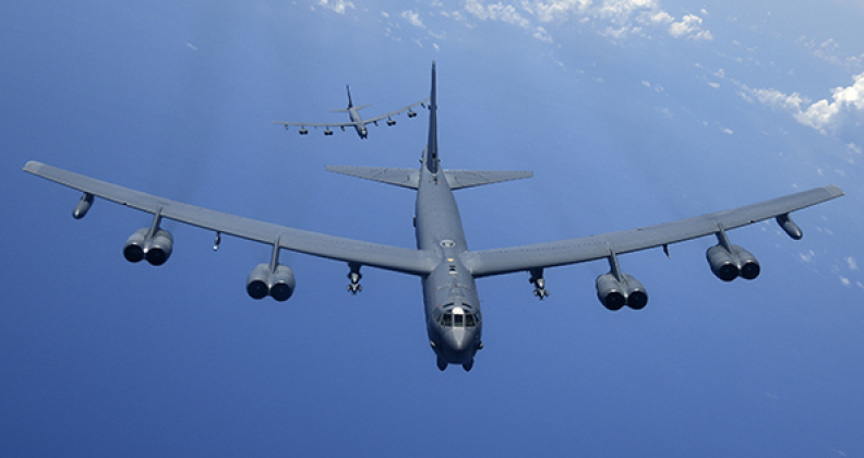 Two U.S. Air Force B-52H Stratofortress bombers fly over the Pacific Ocean during a routine training mission Aug. 2, 2018. This mission was flown in support of U.S. Indo-Pacific Command’s Continuous Bomber Presence operations, which are a key component to improving combined and joint service interoperability. (U.S. Air Force photo by Airman 1st Class Gerald R. Willis)
