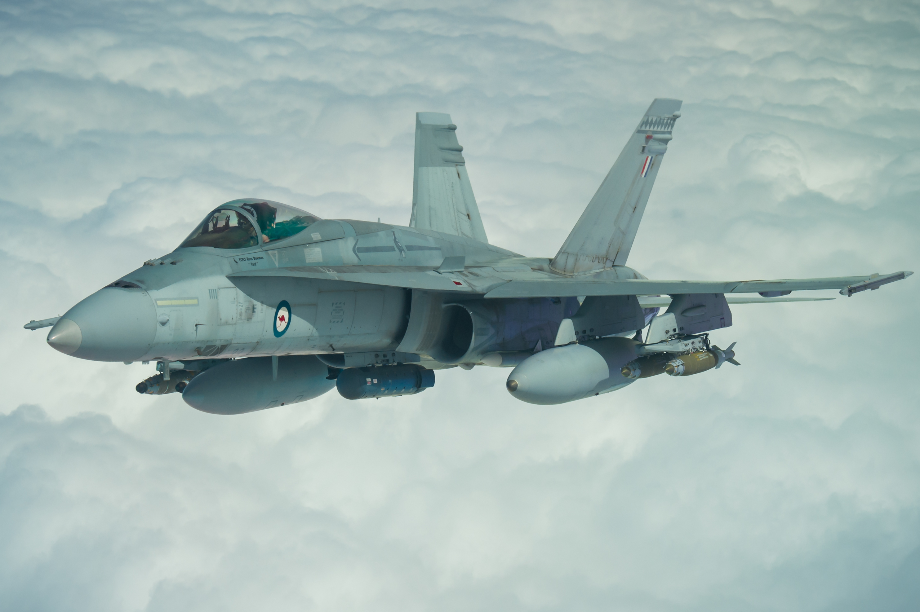 A Royal Australian Air Force F/A-18A Hornet receives fuel from a U.S. Air Force KC-10 Extender while flying a mission in support of Operation Okra over Iraq, March 22, 2017. The RAAF is supporting Combined Joint Task Force-Operation Inherent Resolve through Operation Okra. Since operations commenced in 2014, the F/A-18A Hornets and F/A-18F Super Hornets have flown more than 12,000 hours during more than 2,000 sorties and delivered more than 1,600 munitions. (U.S. Air Force photo/Senior Airman Tyler Woodward)