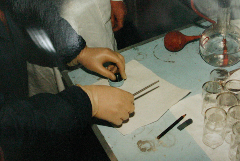 Workers making an assay of highly-enriched uranium at Project Sapphire, Kazakhstan, 1994