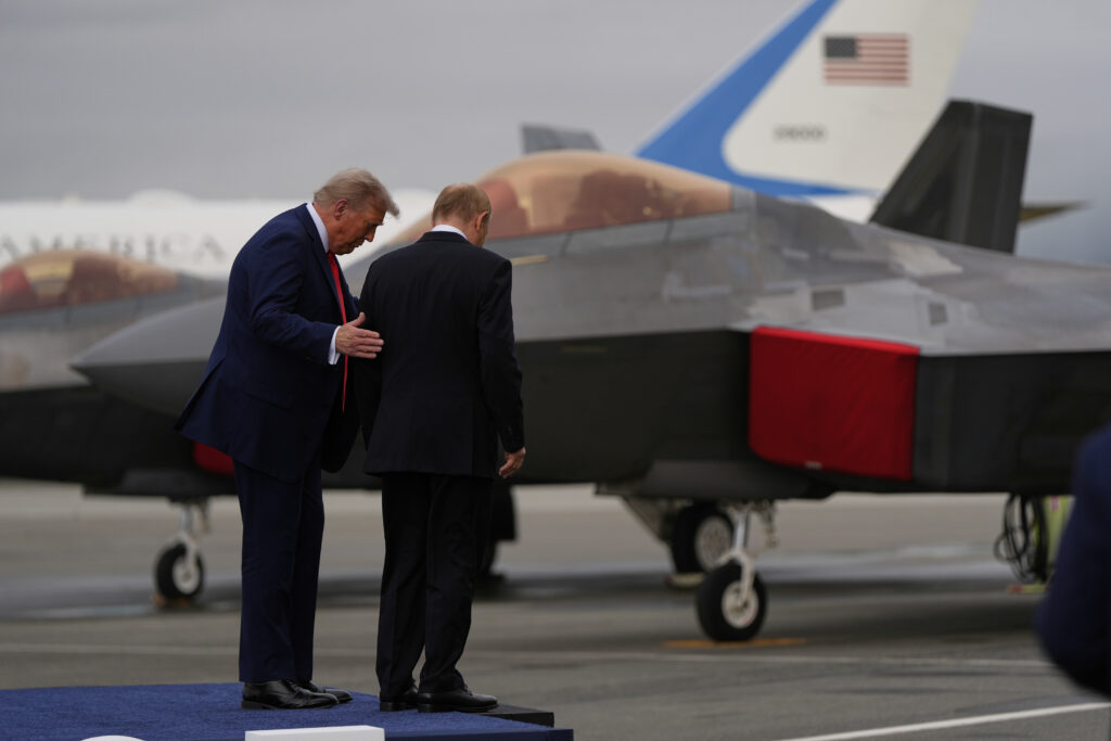 President Donald Trump walks from a stage with Russia's President Vladimir Putin Friday, Aug. 15, 2025, at Joint Base Elmendorf-Richardson, Alaska. (AP Photo/Julia Demaree Nikhinson)