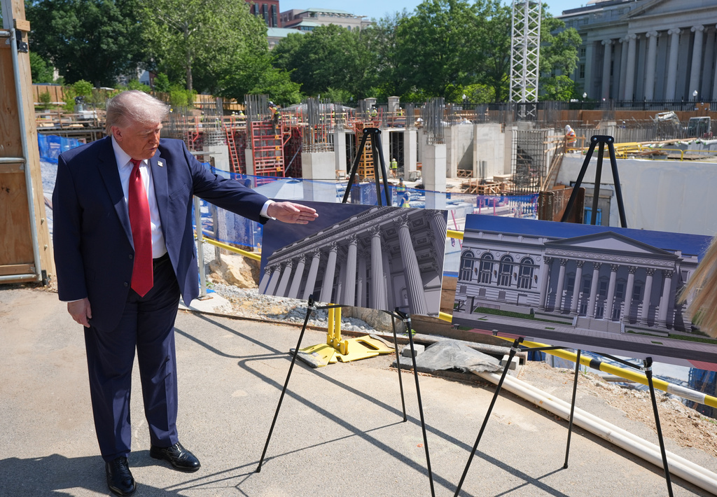 President Donald Trump tours Ballroom construction around the outside the White House, Tuesday, May 19, 2026, in Washington. (AP Photo/Jacquelyn Martin)