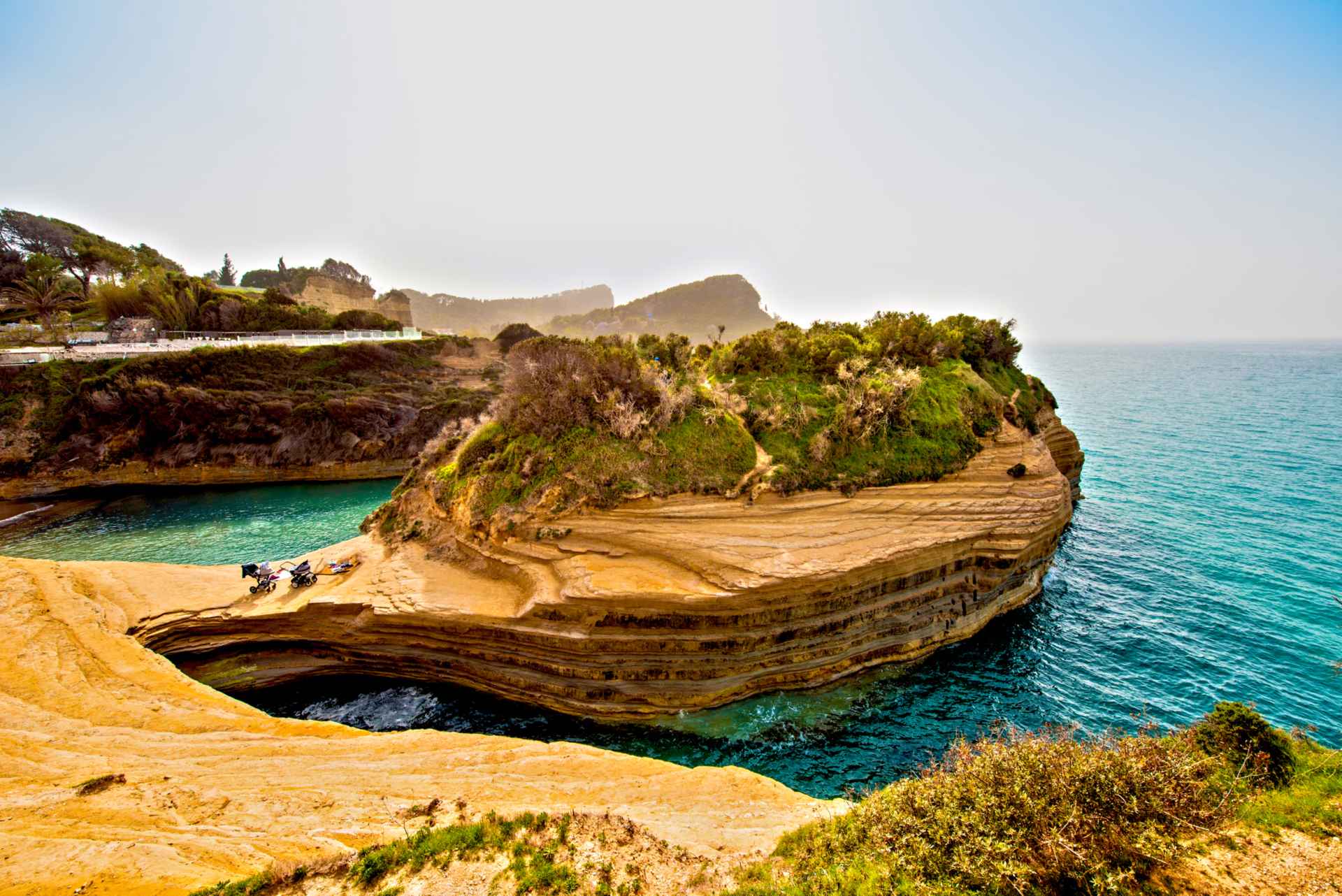 Beautiful landscape with cliffs popular Canal of Love (Canal d'Amour) on the island of Corfu, Greece. tourist attractions. amazing charming place.