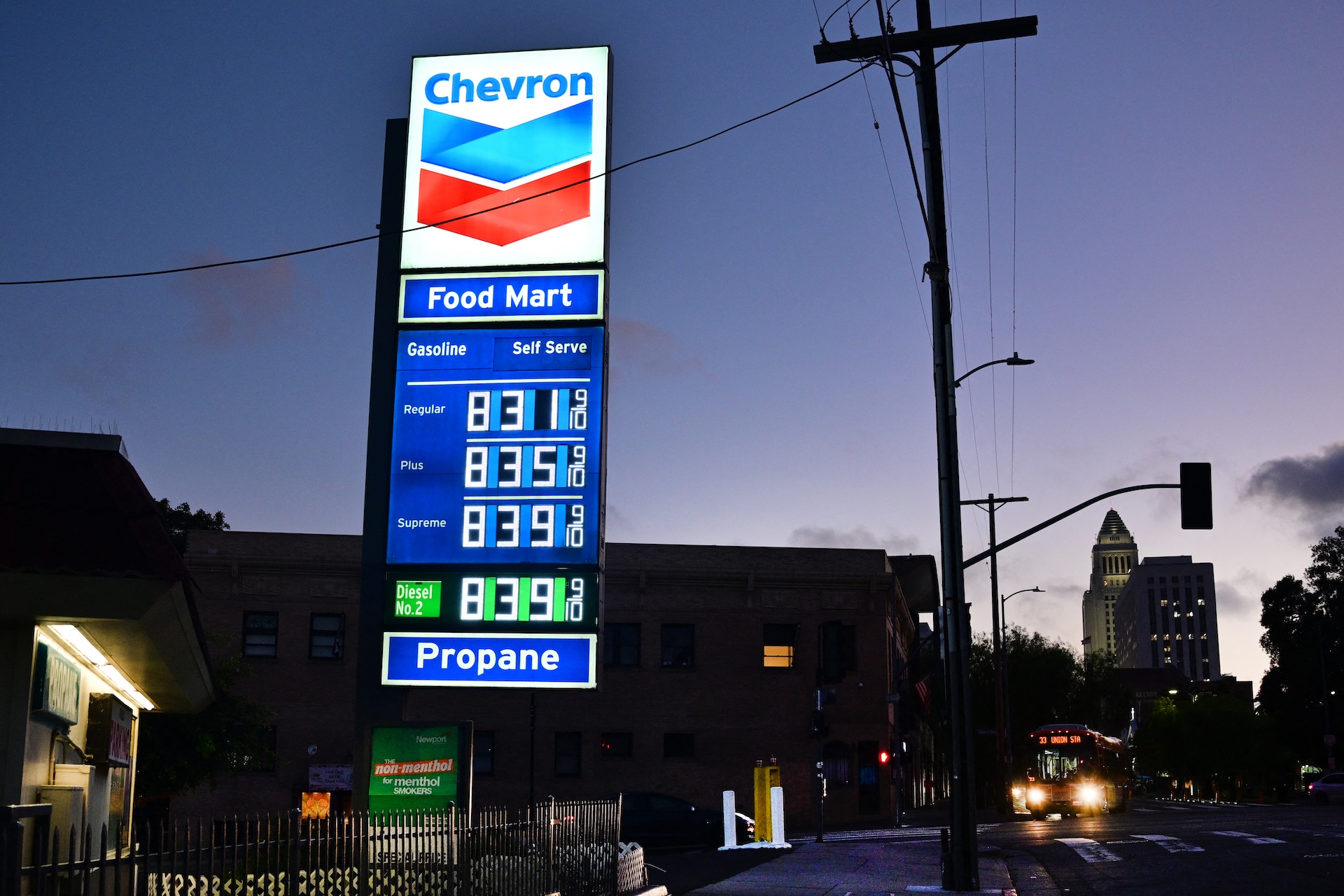 High gas prices are listed at Chevron gas station in Los Angeles on March 9, 2026, as gasoline prices surge amid the ongoing war with Iran. The Iran war has sent oil prices soaring on March 9 after Tehran, under new leader Mojtaba Khamenei, fired a new barrage of missiles at its Gulf neighbours and signalled that the strategic Strait of Hormuz would likely remain shut. (Photo by Frederic J. BROWN / AFP)