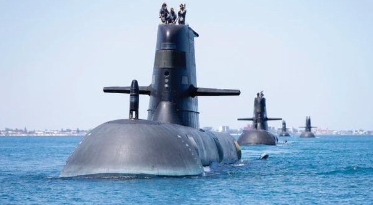 Collins Class submarines HMAS Collins, HMAS Farncomb, HMAS Dechaineux and HMAS Sheean in formation while transiting through Cockburn Sound, Western Australia.