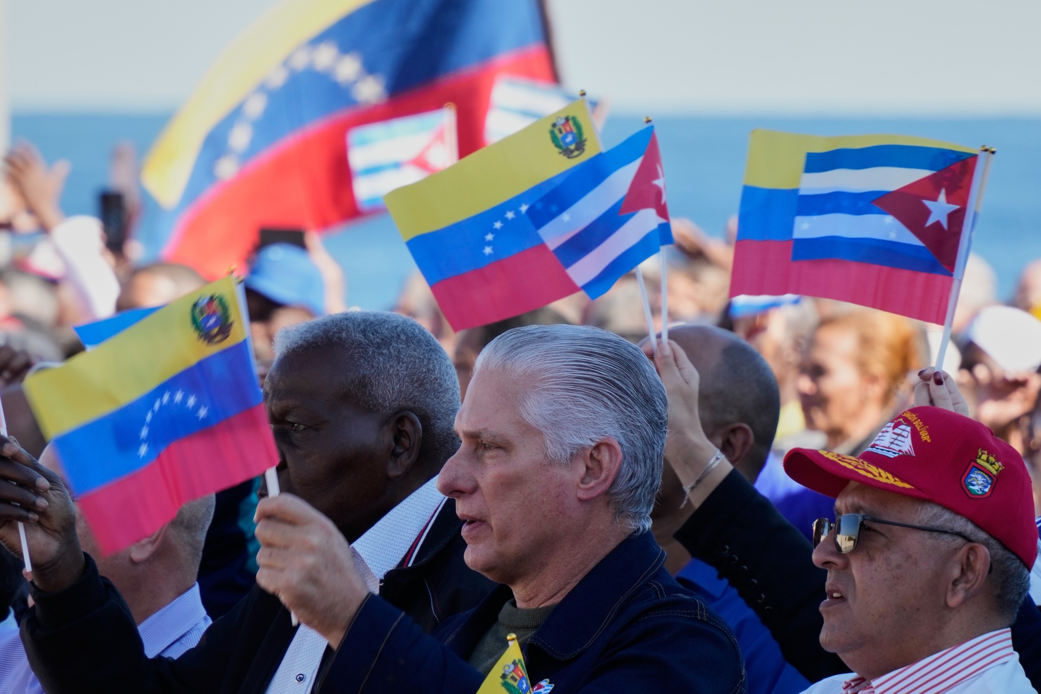 Cuban President Miguel Diaz-Canel attends a rally in Havana, Cuba, Saturday, Jan. 3, 2026, in solidarity with Venezuela after the U.S. captured President Nicolas Maduro and flew him out of Venezuela. (AP Photo/Ramon Espinosa)