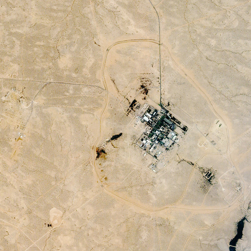 Dimona nuclear reactor, Israel. Satellite image of secret nuclear research facility in the Negev desert, Israel. Although classed as a site for processing irradiated fuel, it is alleged that the Dimona reactor is also used to produce nuclear weapons. This image was produced by the Ikonos satellite, the first commercial satellite to collect data at one-metre resolution. Launched in 1999, Ikonos orbits at an altitude of 681 kilometres. Image taken on 4 July 2000.