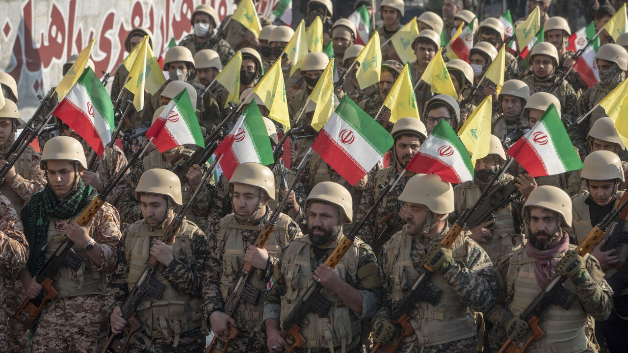 TEHRAN, IRAN - JANUARY 10: Members of the Iranian Basij paramilitary force march during the force parade during military manoeuvres on January 10, 2025 in Tehran, Iran. The Islamic Revolutionary Guard Corps (IRGC) and Basij, a paramilitary group that has played a prominent role in suppressing protests, held military manoeuvres in the Iranian capital. (Photo by Majid Saeedi/Getty Images)