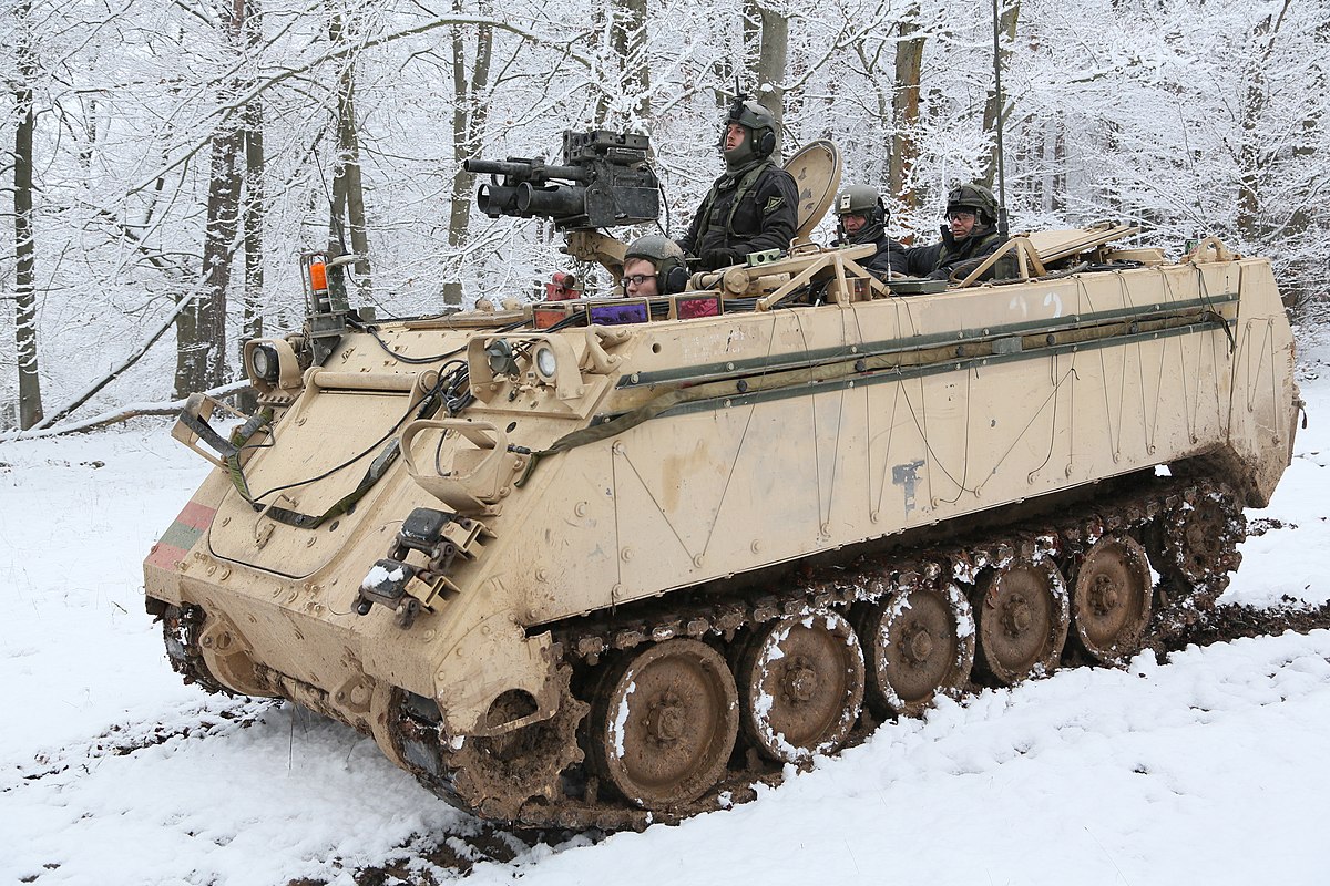 A U.S. Army M113 Armored Personnel Carrier of 1st Battalion, 4th Infantry Regiment provides an over watch while conducting recon operations during exercise Allied Spirit at the Joint Multinational Readiness Center in Hohenfels, Germany, Jan. 26, 2015. Exercise Allied Spirit includes more than 2,000 participants from Canada, Hungary, Netherlands, United Kingdom, and the U.S. Allied Spirit is exercising tactical interoperability and testing secure communications within Alliance members. (U.S. Army photo by Spc. Tyler Kingsbury/Released)