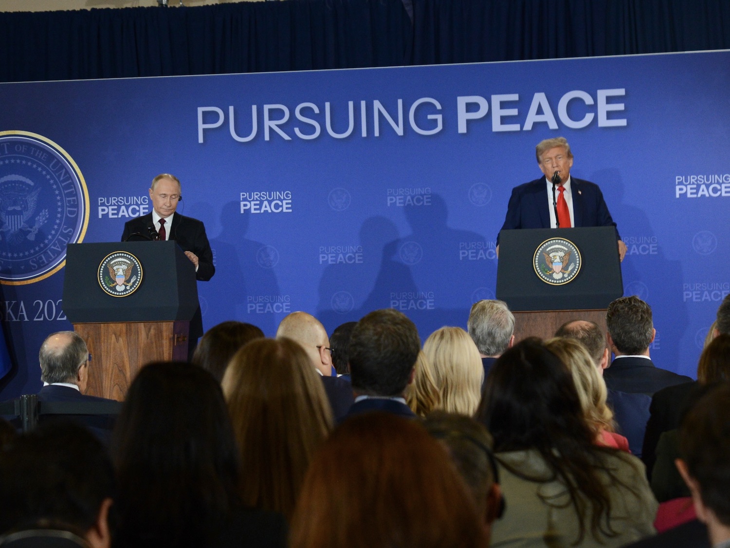 President Donald Trump and Russian President Vladimir Putin speak Friday, Aug. 15, 2025, at Joint Base Elmendorf-Richardson in Anchorage, Alaska. (Photo by James Brooks/Alaska Beacon)