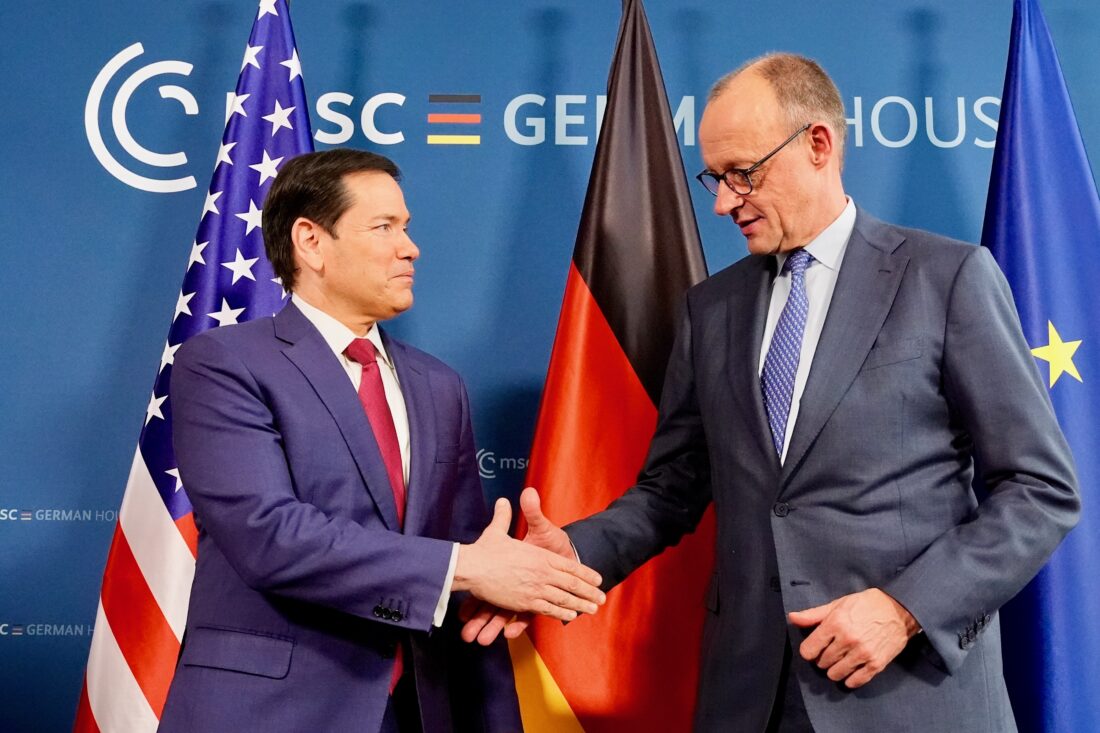 U.S. Secretary of State Marco Rubio, left, and Germany's Chancellor Friedrich Merz shake hands in Munich, Germany, Friday, Feb. 13, 2026, at the the Munich Security Conference. (AP Photo/Alex Brandon, Pool)