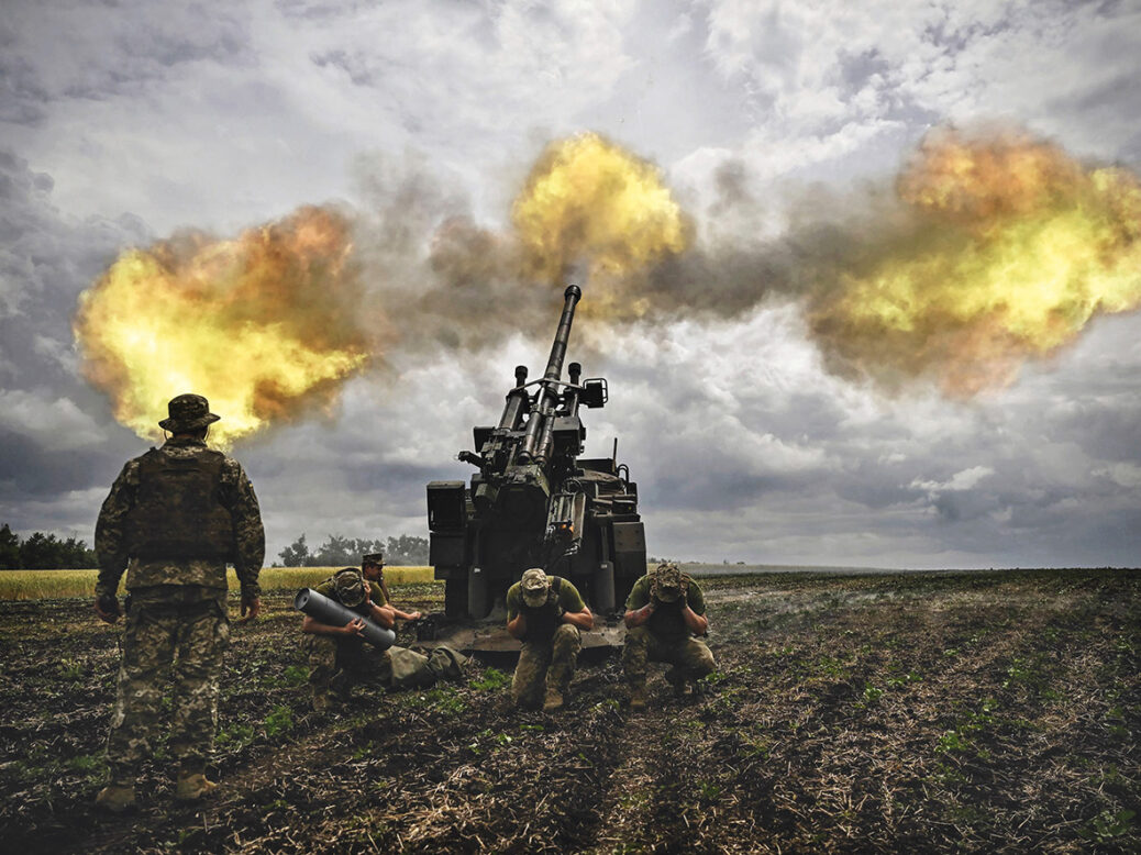 Ukrainian servicemen fire with a French self-propelled 155 mm/52-calibre gun Caesar towards Russian positions at a front line in the eastern Ukrainian region of Donbas on June 15, 2022. - Ukraine pleaded with Western governments on June 15, 2022 to decide quickly on sending heavy weapons to shore up its faltering defences, as Russia said it would evacuate civilians from a frontline chemical plant. (Photo by ARIS MESSINIS / AFP) (Photo by ARIS MESSINIS/AFP via Getty Images)