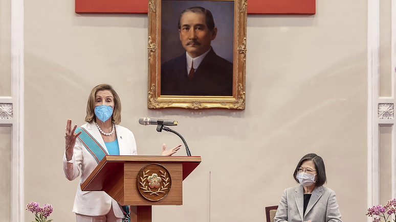 FILE - In this photo released by the Taiwan Presidential Office, U.S. House Speaker Nancy Pelosi speaks during a meeting with Taiwanese President President Tsai Ing-wen, second from right, in Taipei, Taiwan, Wednesday, Aug. 3, 2022. China is staging live-fire military drills in six self-declared zones surrounding Taiwan in response to a visit by Pelosi to the island Beijing claims as its own territory. (Taiwan Presidential Office via AP, File)