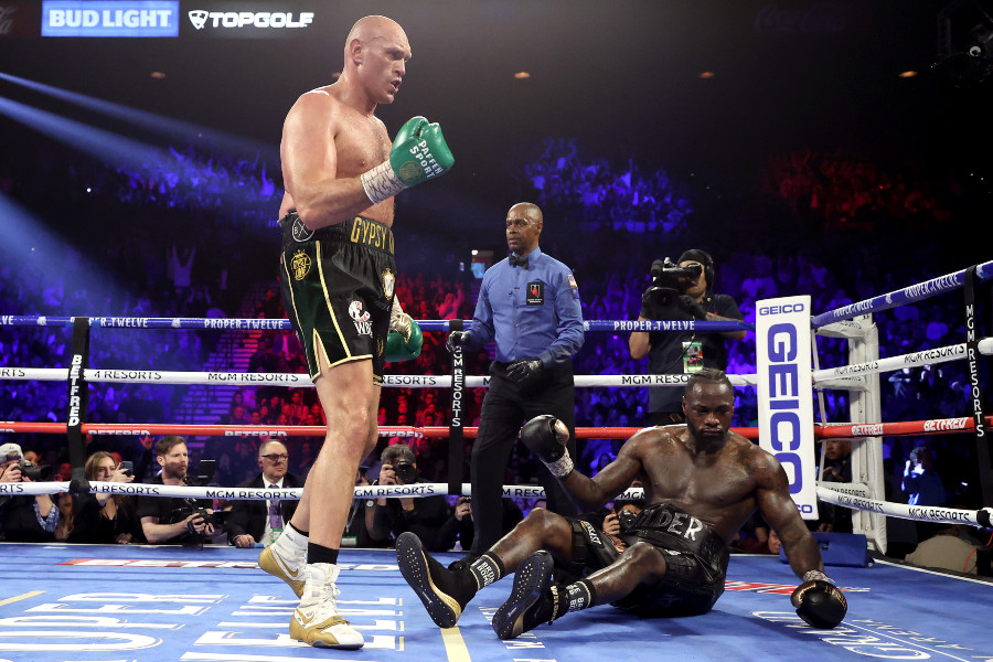 LAS VEGAS, NEVADA - FEBRUARY 22:  Tyson Fury knocks down Deontay Wilder in the fifth during their Heavyweight bout for Wilder's WBC and Fury's lineal heavyweight title on February 22, 2020 at MGM Grand Garden Arena in Las Vegas, Nevada. (Photo by Al Bello/Getty Images)