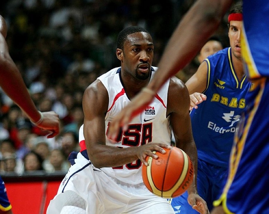 GUANGZHOU, CHINA - AUGUST 8:  Gilbert Arenas of the USA Senior Men's National Team drives against Brazil Men's National Team during the China Basketball Challenge August 8, 2006 in Guangzhou, Guangdong province, China. USA won the game, 90-86.  (Photo by Guang Niu/Getty Images)