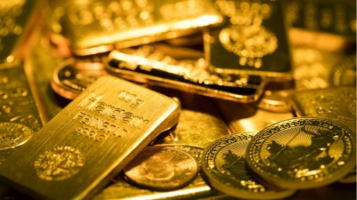 «Πλήγωσε» τον χρυσό το ισχυρό δολάριο – Οριακές απώλειες για την εβδομάδα