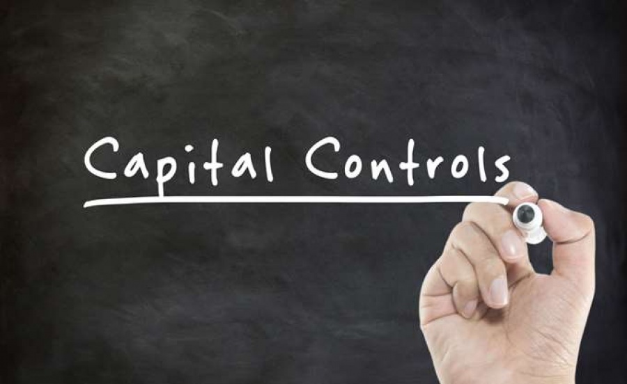 Καθυστερεί η οριστική άρση των capital controls – Τι συζήτησαν Στουρνάρας – τραπεζίτες και η θέση Μουρμούρα