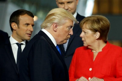 Macron και Merkel «τρέχουν» στις ΗΠΑ για να πείσουν τον Trump να αλλάξει τακτική με τους δασμούς