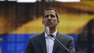 WSJ: Σε διαπραγματεύσεις με τον Jouan Guaido η Κίνα