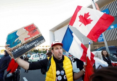 Εξοργισμένοι οι Γάλλοι ξεσηκώνονται κατά των μέτρων κορωνοϊού όπως οι Καναδοί - Κύμα πορειών σε Παρίσι, Βρυξέλλες