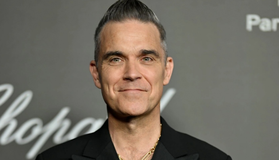 Ο Robbie Williams ξεπέρασε τους Beatles σε αριθμό άλμπουμ που κατέκτησαν την κορυφή στη Βρετανία