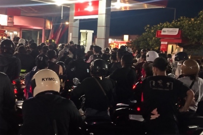 Bali fuel chaos as gas sold in bottles on the street