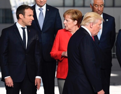 Επική «μάχη» στο Davos - Merkel και Macron εναντίον Donald Trump και προστατευτισμού